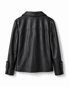 Back view of women’s black sheepskin leather jacket