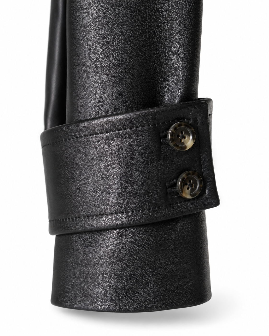 Buttoned cuff-tab detail on black sheepskin jacket