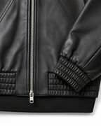 YKK front zip and elasticated leather hem detail