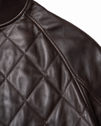 Diamond-quilted sheepskin leather panel detail