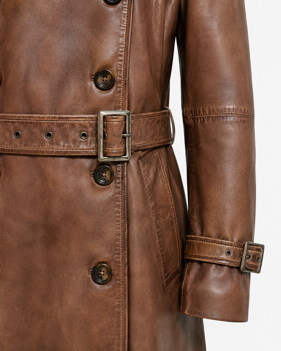 Leather waist belt and buckled cuff detail on brown trench coat