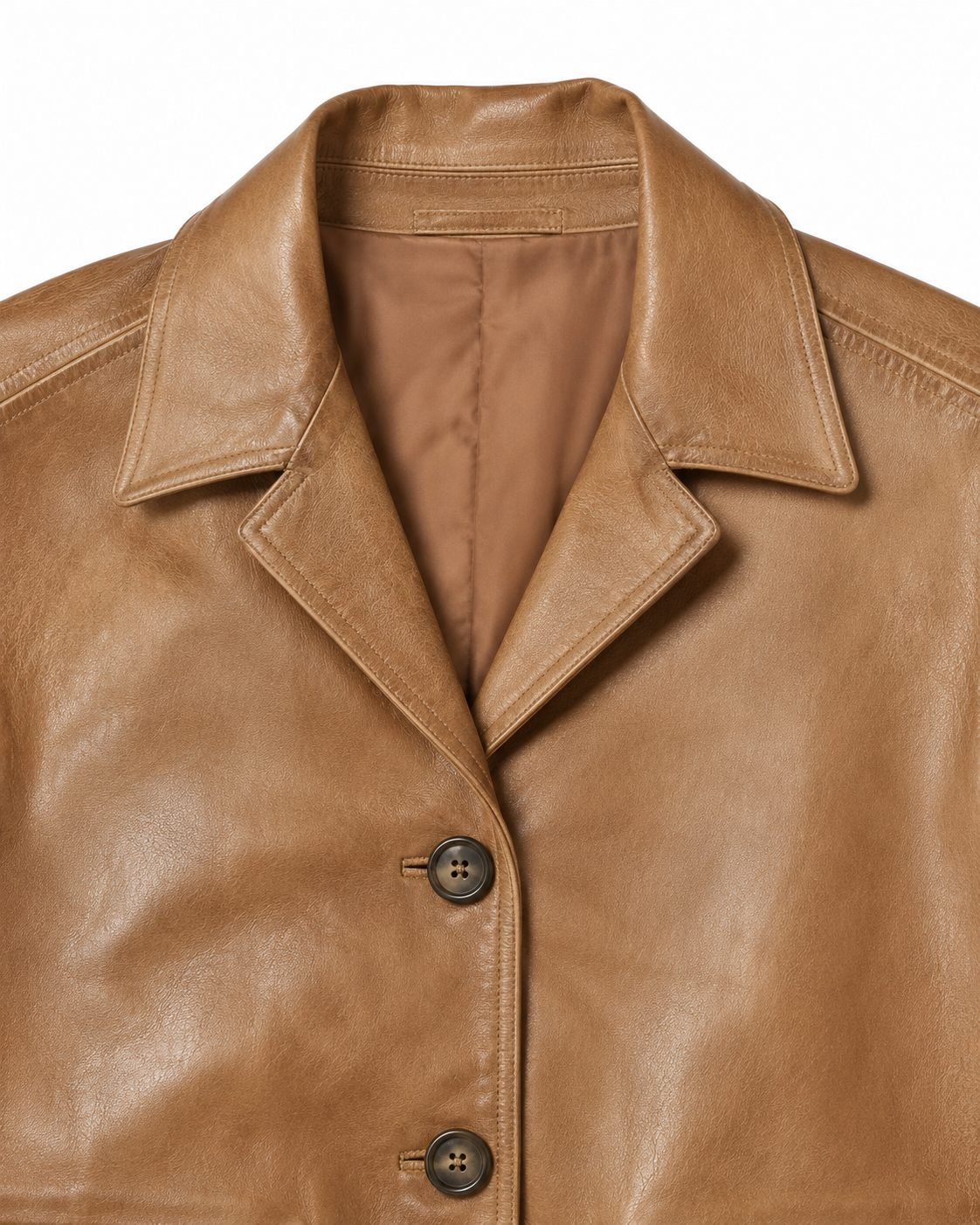 Notched lapel and horn-style button detail on tan leather blazer